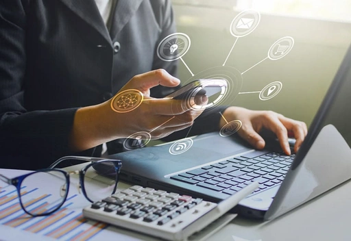 Financial services professional reviewing banking systems on a screen