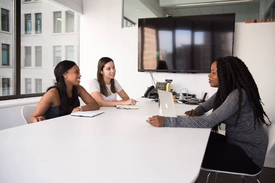 HR team reviewing resumes and interviewing applicants