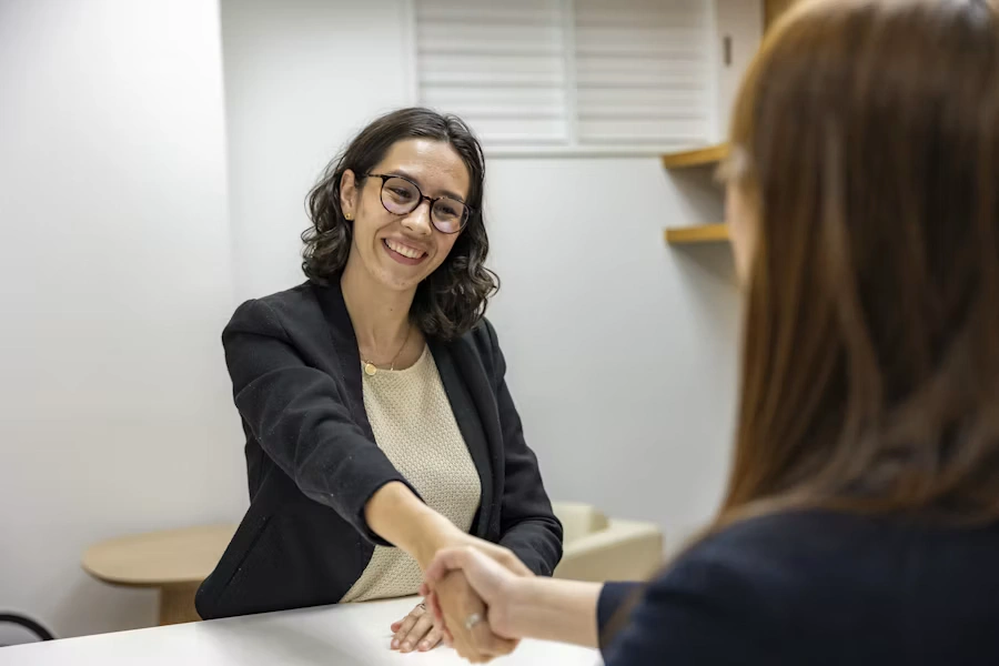 Recruiter reviewing candidate resumes for staffing