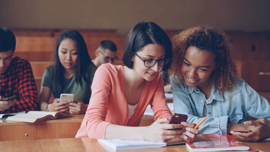 Students using digital learning technology in a lecture hall