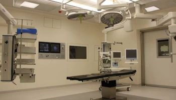 Radiologist reviewing medical imaging on screen