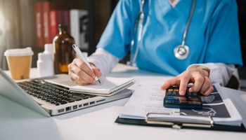 Medical billing and revenue cycle management on a laptop
