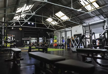 Gym floor with members training