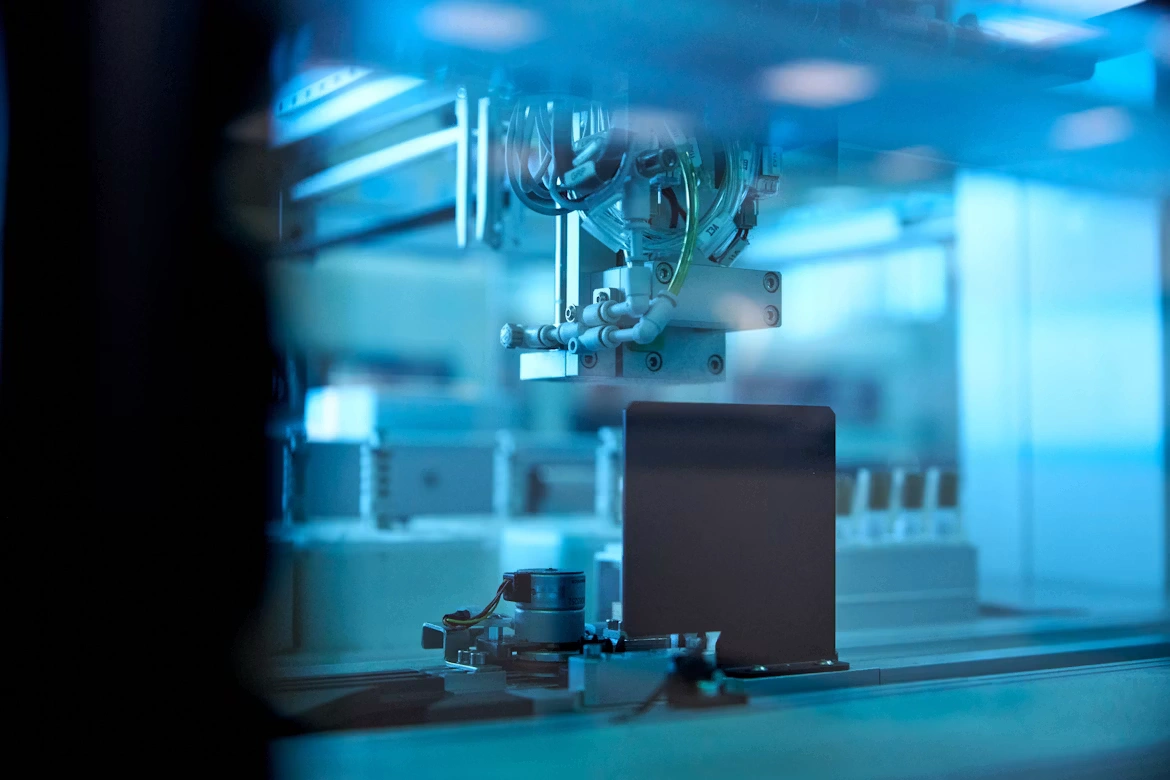 Manufacturing engineer working with automated inventory systems