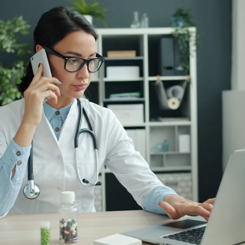 Healthcare professional using a digital tablet for virtual care