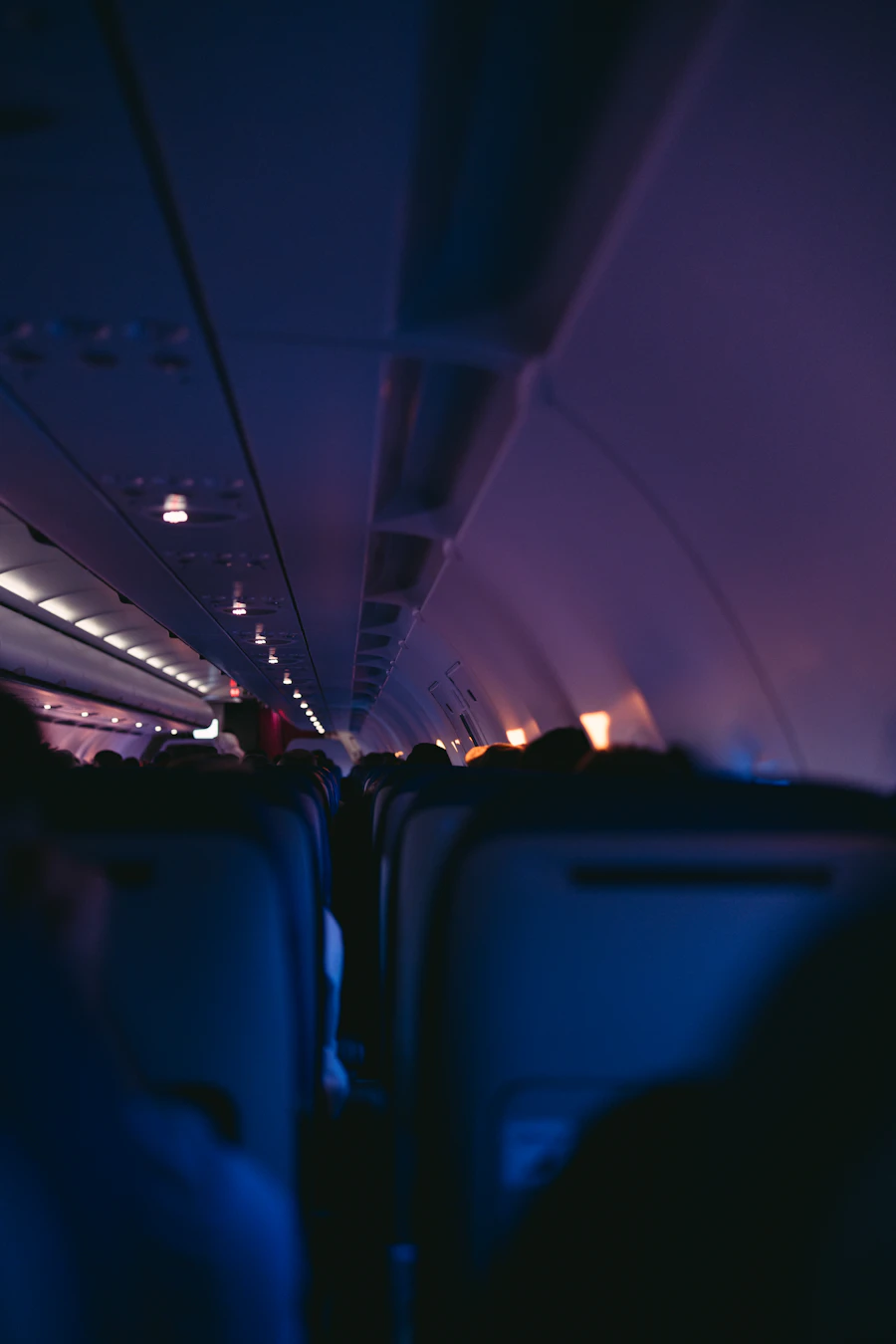 Airplane cabin in flight, representing airline technology solutions